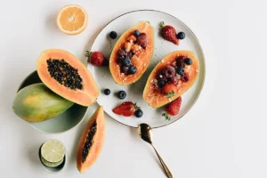 Ripe papaya slices with seeds, showcasing their expert-backed health benefits.