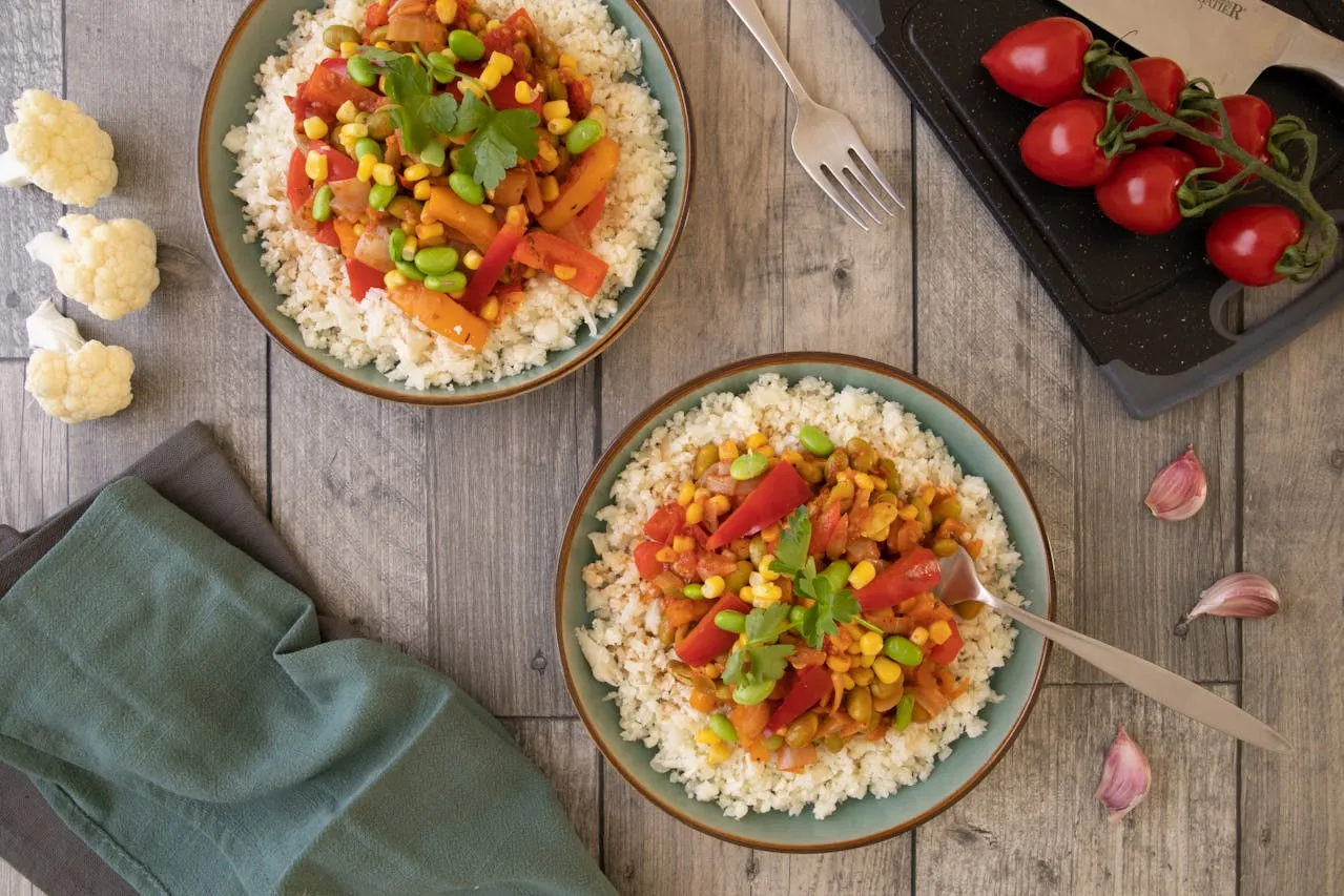 Bowl of creamy Arborio rice with herbs, highlighting its surprising health benefits.