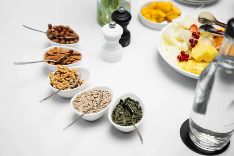 Fresh walnuts on wooden board with brain and heart health icons