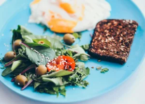 Black and white sesame seeds with nutrition labels showing 12 science-backed health benefits