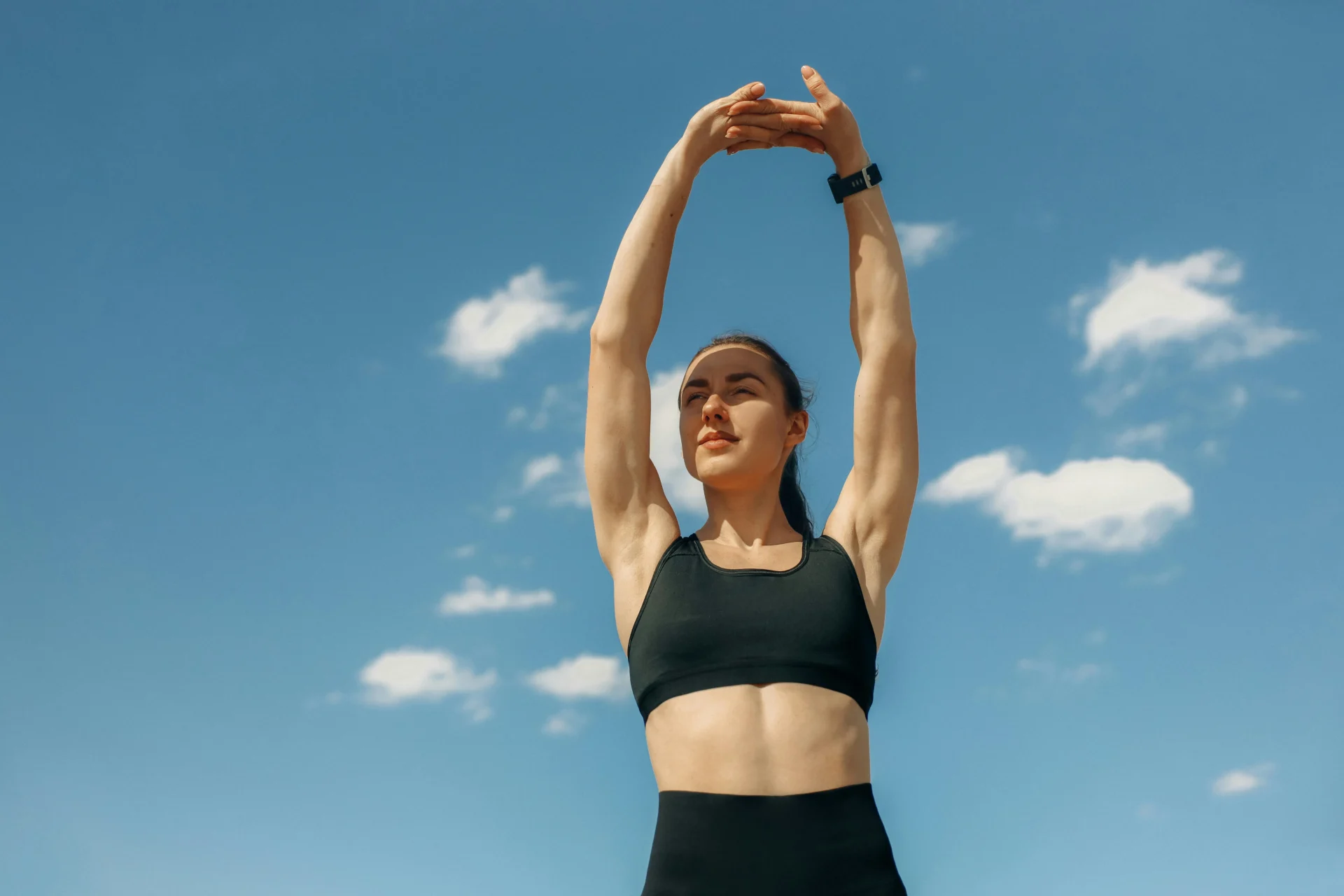 A woman feeling energised and confident, representing natural ways to boost female libido through lifestyle and herbal remedies.