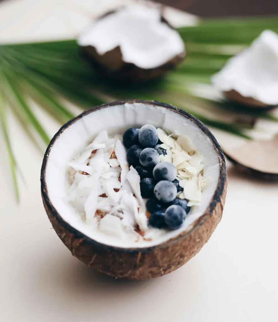 Close-up of thick, creamy overnight oats made without yogurt or milk, topped with almond butter and banana slices