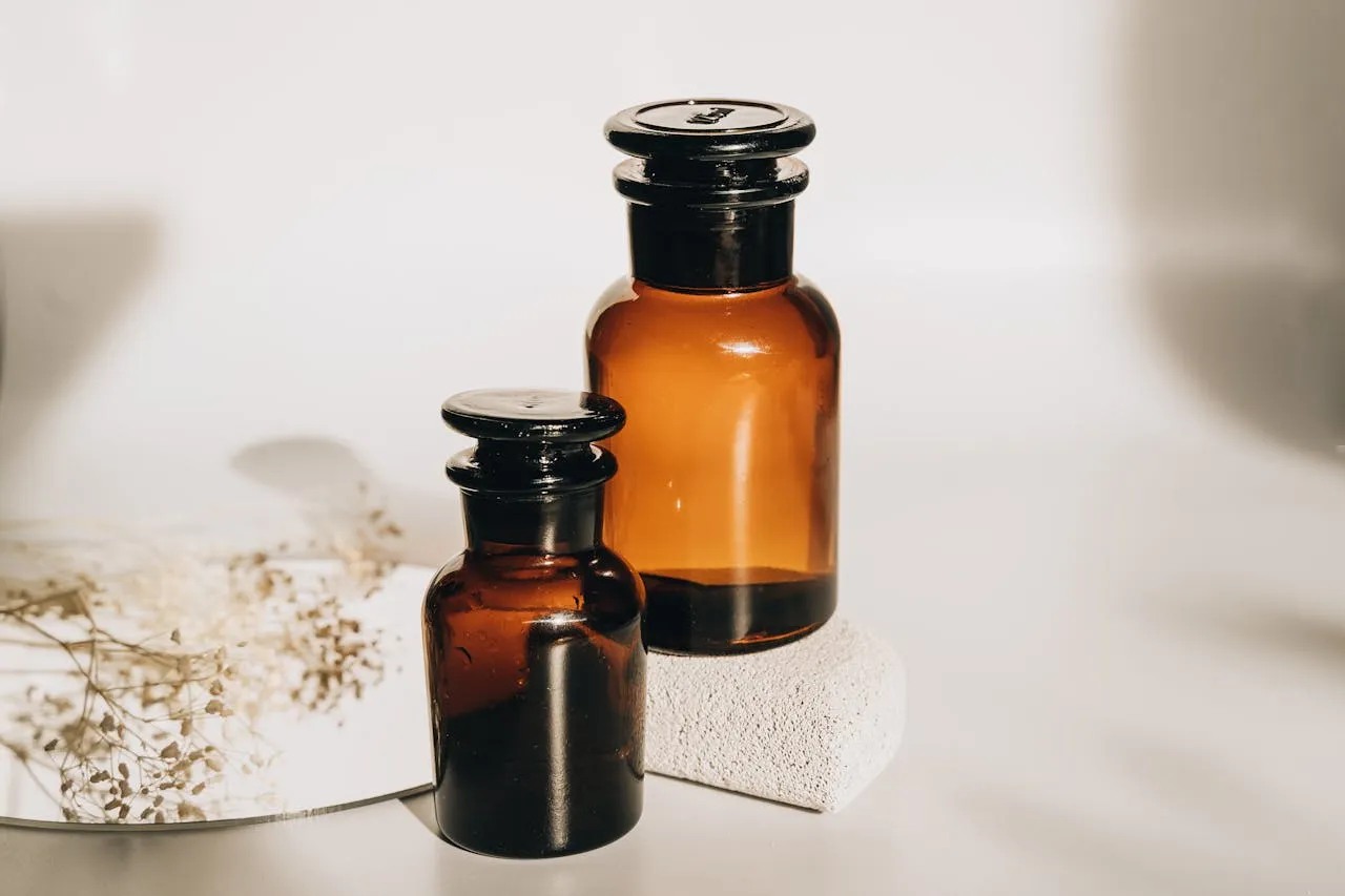 Black seed oil bottle placed beside an open Quran, symbolizing natural healing in Islamic tradition