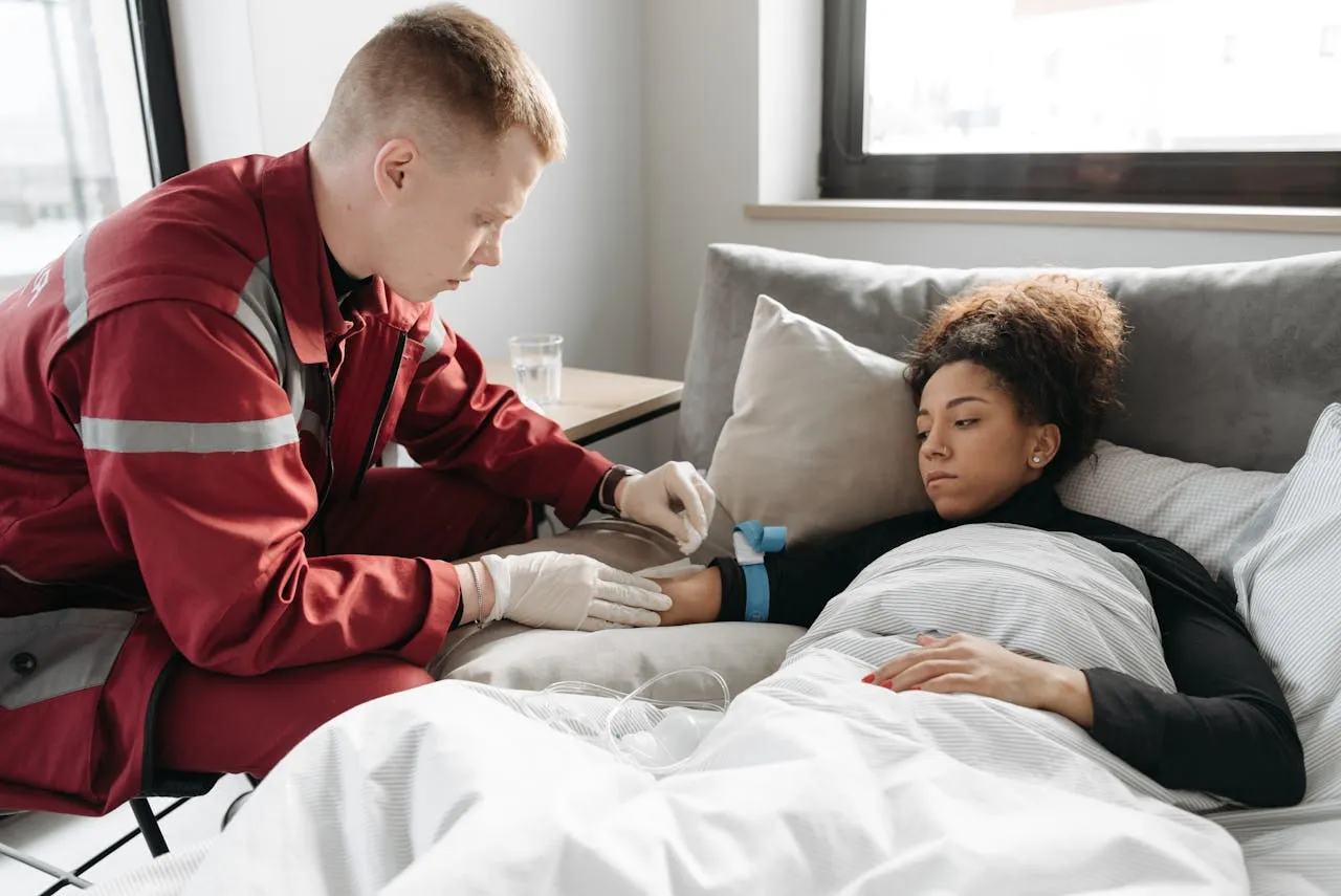 Emergency first aid for electric shock—rescuer performing safety steps to save a victim.