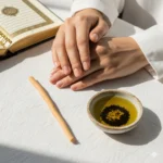 Muslim womanβs hands with clean natural nails, miswak, and olive oil showing Islamic nail care and hygiene