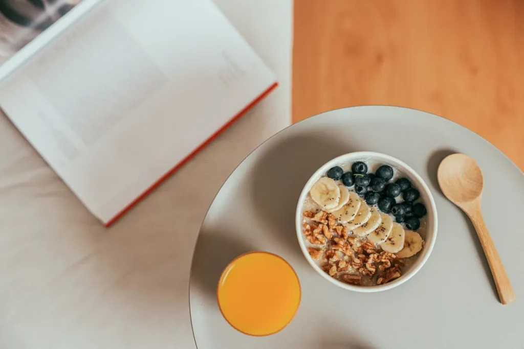 A nourishing Sunnah breakfast bowl with dates, honey, and barley, representing Islamic wellness and healthy eating.